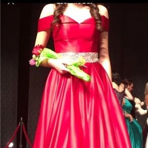 Formal dress for pageant or prom.  Color is red and in good condition.  Size 0
